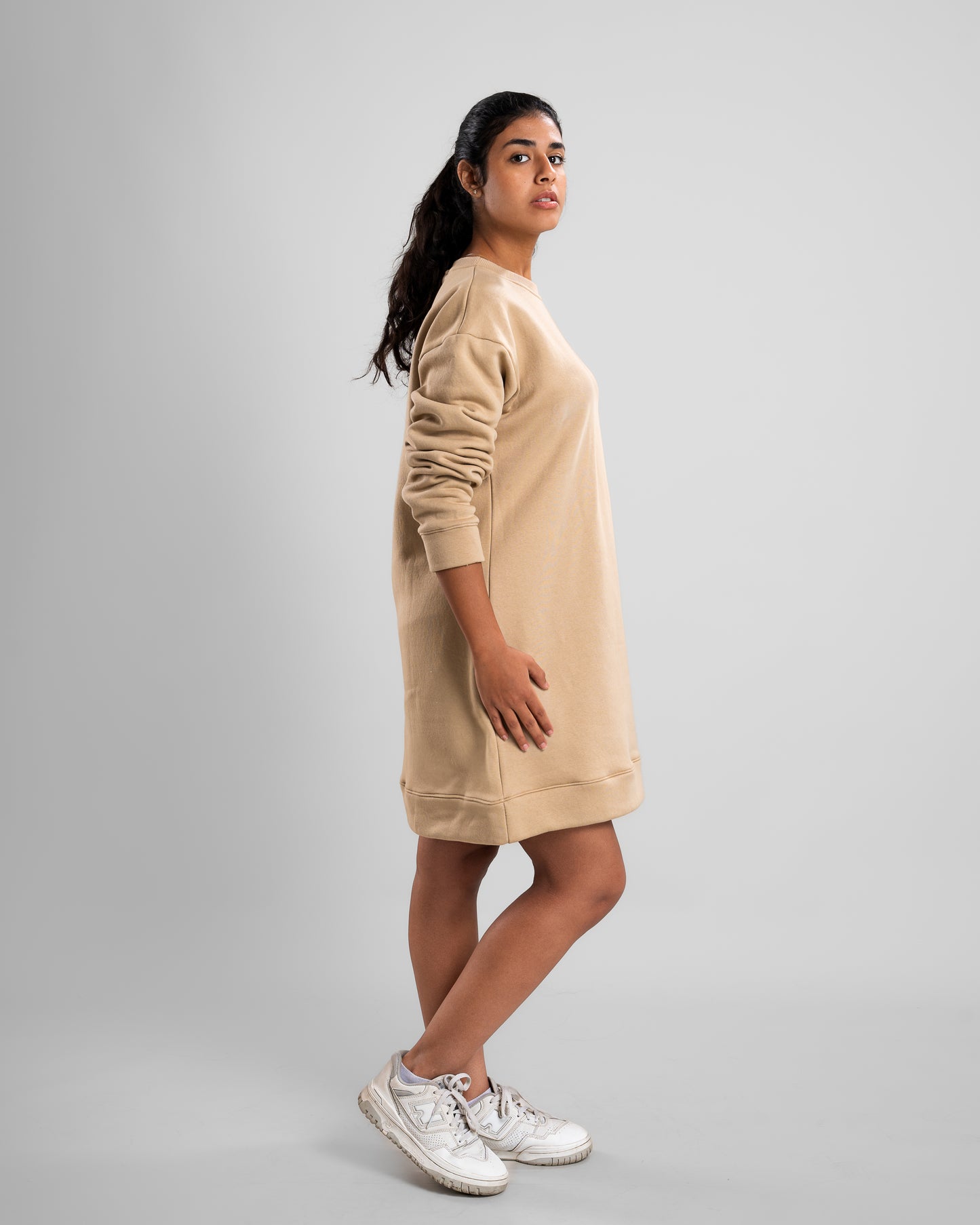 side view of Café Crew Neck Short Dress showing heavy Melton fabric for a cozy winter look.